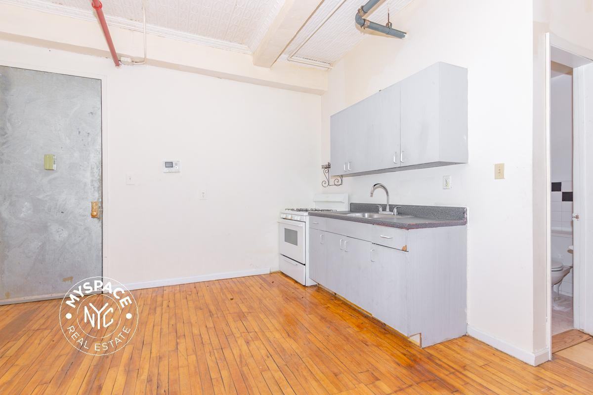 175 Stockholm St #209 - Photo 2 of 18