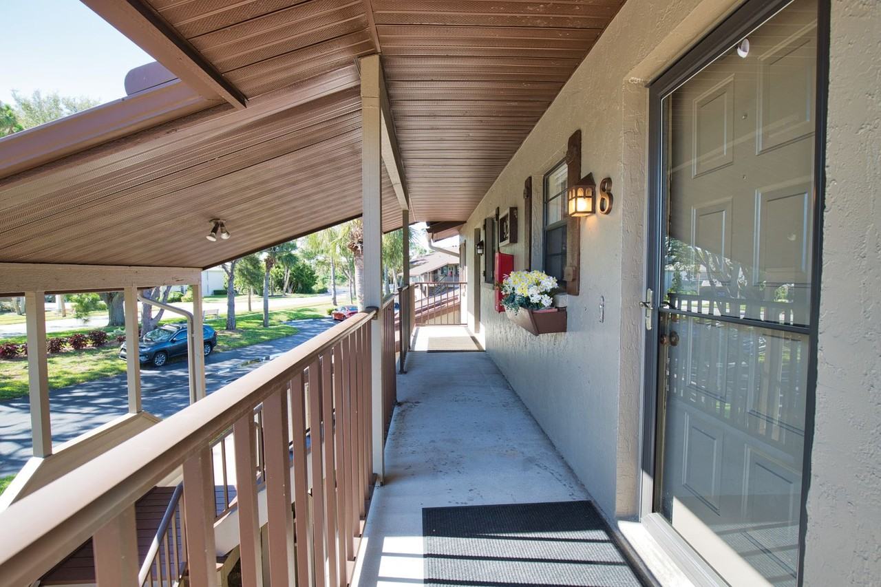927 Capri Isles Blvd #8 - Photo 3 of 22