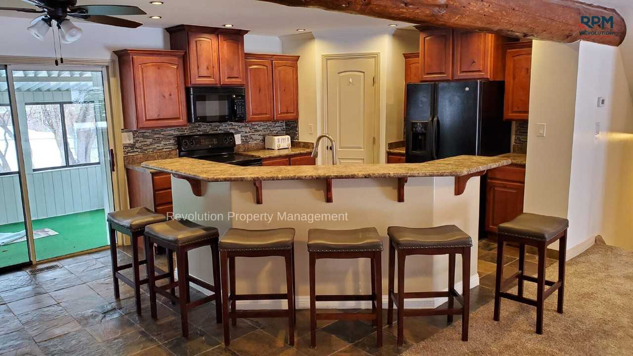 1318 E 4225 S - Photo 5 of 11
