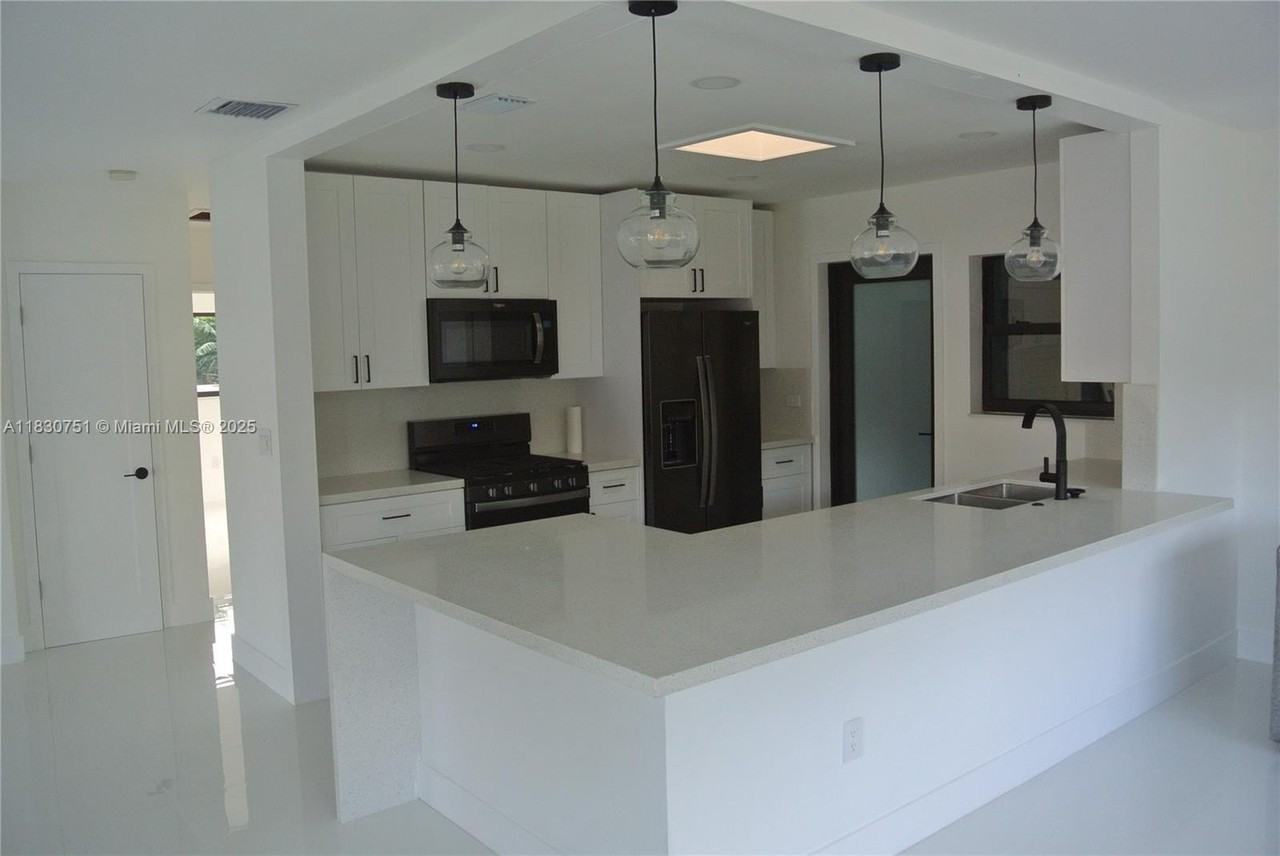 10230 Dolphin Rd #1 - Photo 3 of 28