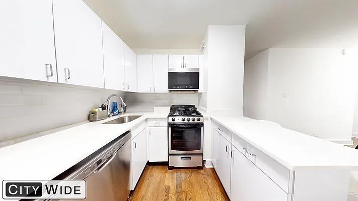 E 16th St #2A - Photo 4 of 20