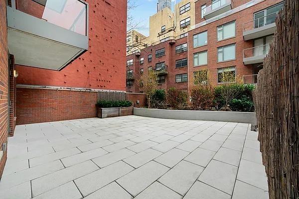 E 14th St #210 - Photo 6 of 18