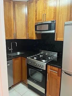 W 15th St #104 - Photo 4 of 20