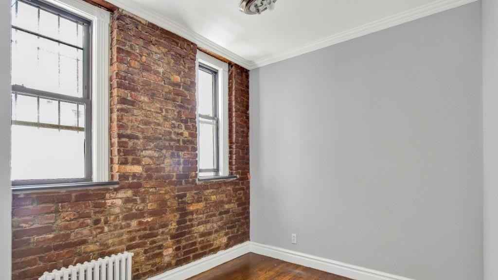 E 13th St #1C - Photo 3 of 6