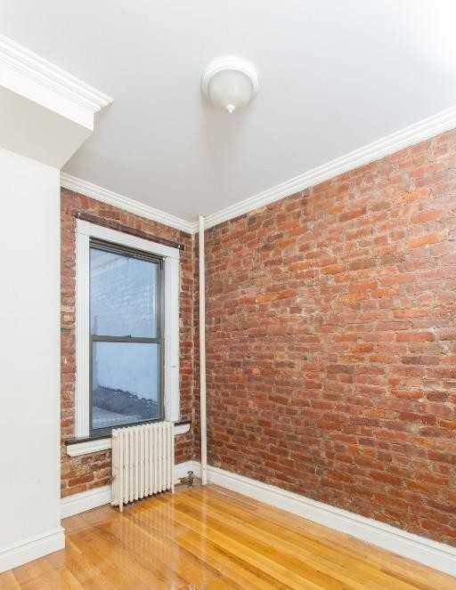 E 13th St #2D - Photo 3 of 5