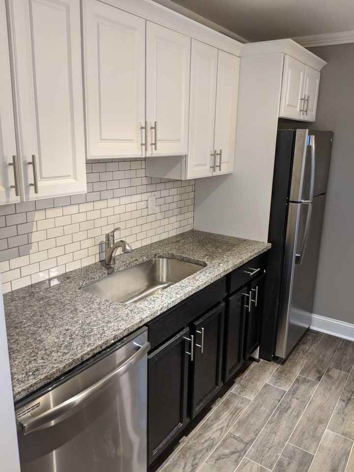 Frost Courtyard Apartments - - Photo 2 of 17