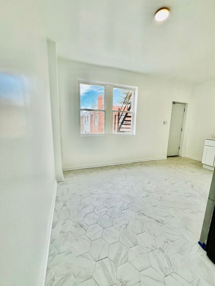 7607 Ogontz Ave - Photo 3 of 13