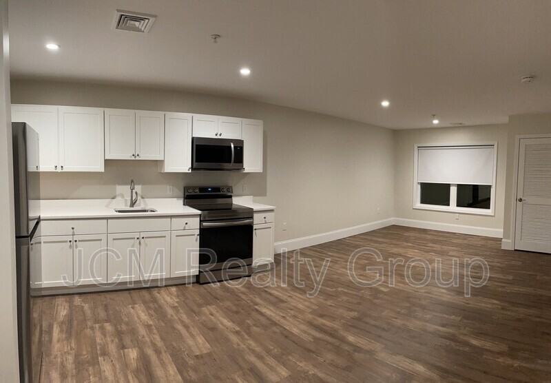 5 Paul Francis Way #9-2ndFL - Photo 2 of 16