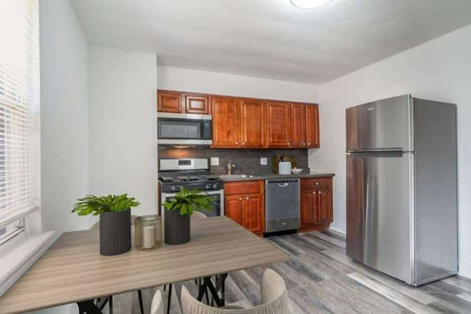 Tall Tree Village Apartments - Photo 6 of 22