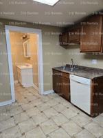featured image of 303 W 6th St