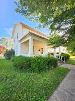 featured image of 113 E 3rd St