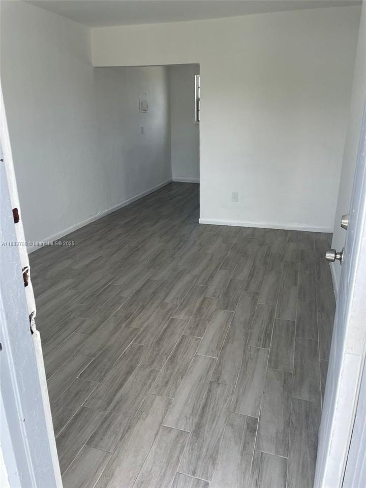 1261 Nw 59th St #4 - Photo 2 of 7