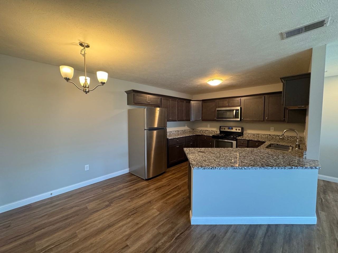 1037-1041 Ekstam Drive - Photo 3 of 11