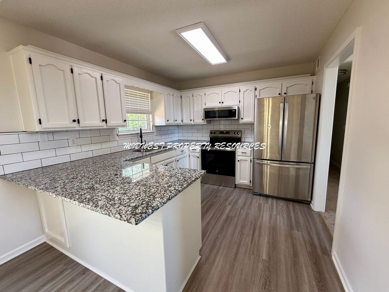 1708 Ne Stonewood Dr - Photo 3 of 26
