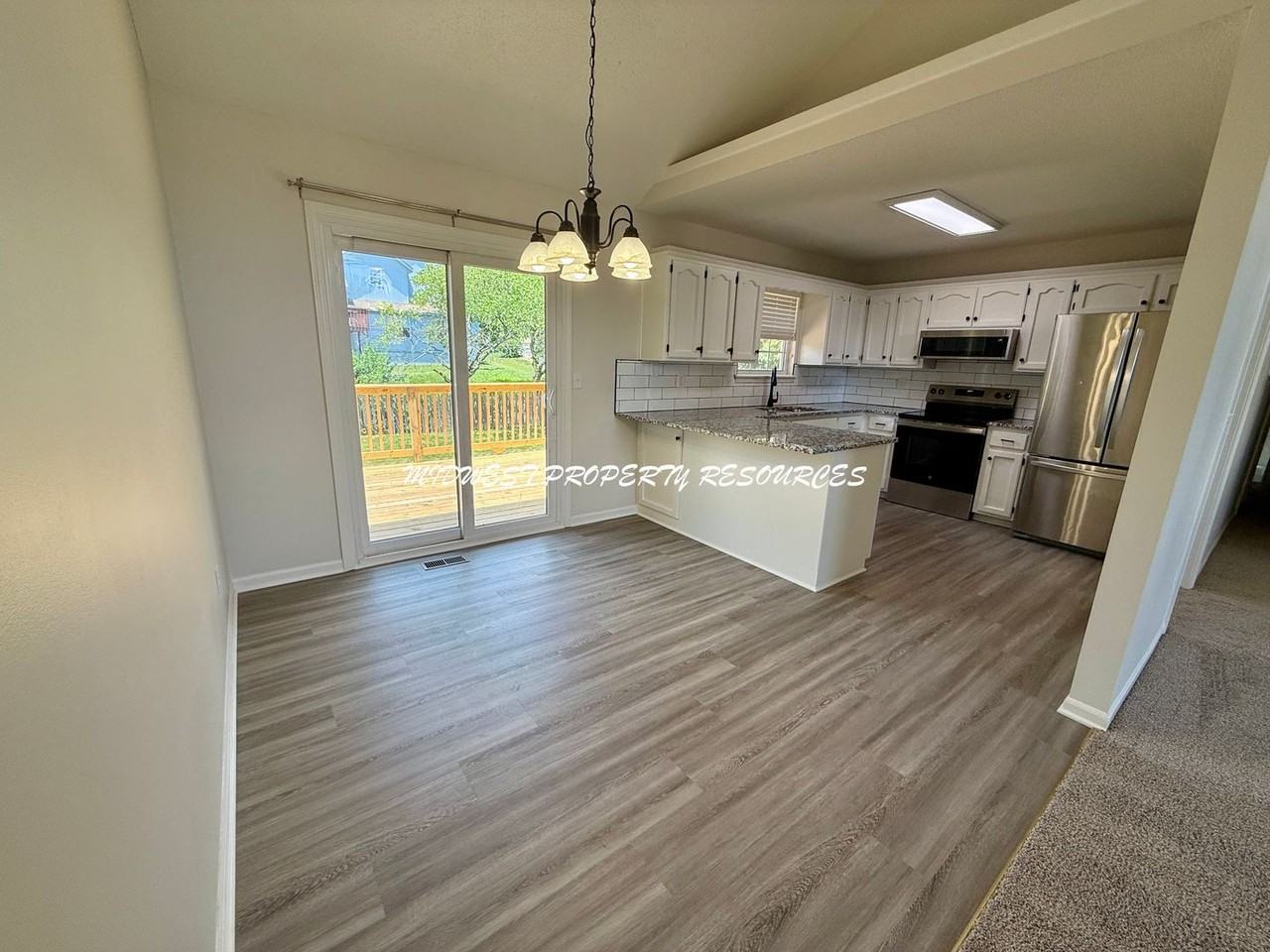 1708 Ne Stonewood Dr - Photo 6 of 26