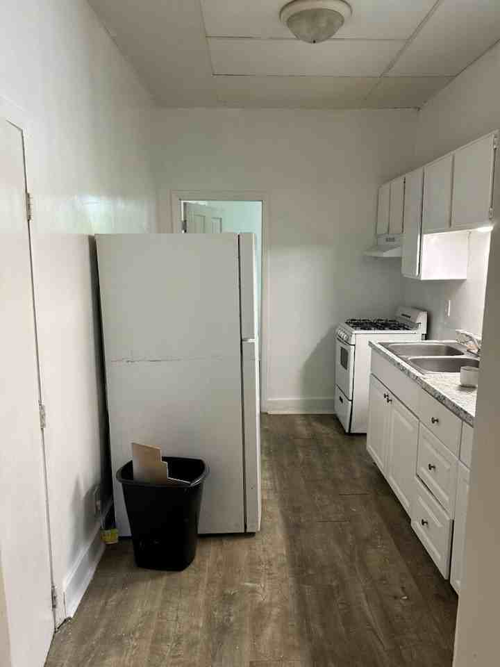 117 E 3rd St - Photo 2 of 3