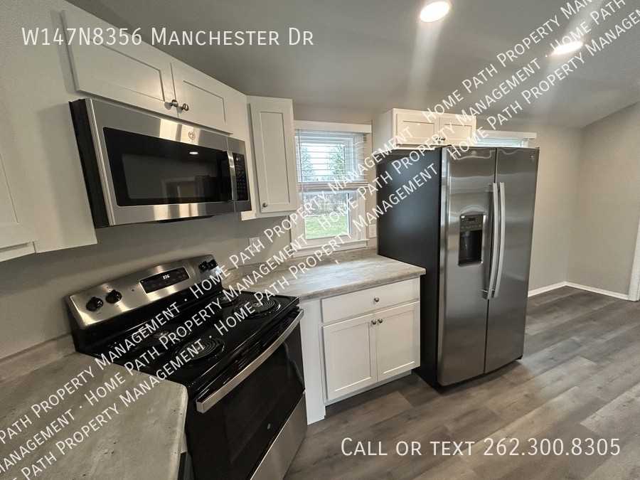 W147N8356 Manchester Dr - Photo 2 of 18