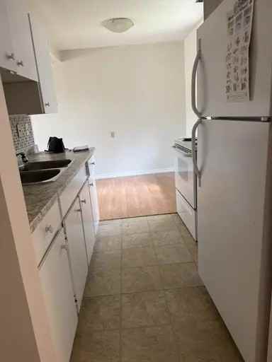 8299 29 Ave Nw #8299 - Photo 2 of 3