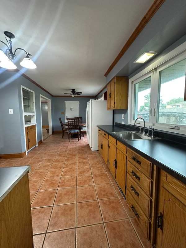 14247 S Marquette Ave - Photo 3 of 12