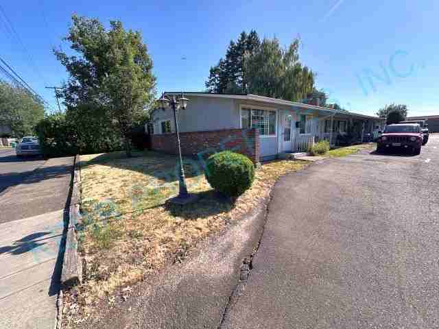 220 Ne Liberty Ave - Photo 2 of 18