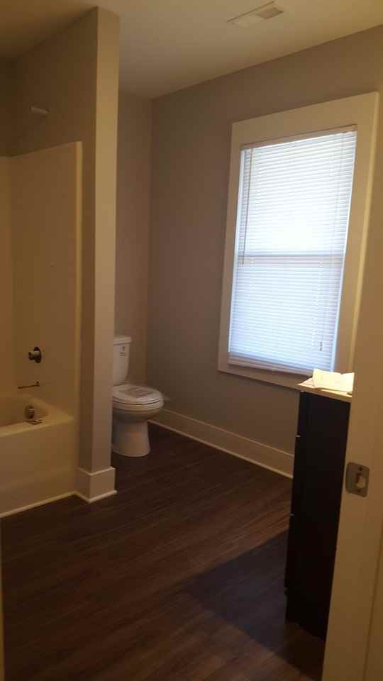 411 W 3rd St - Photo 2 of 12