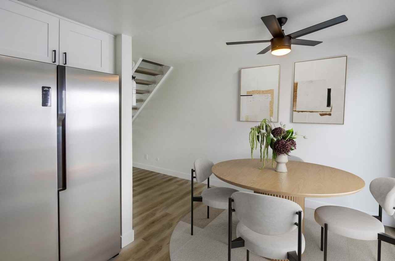 Two bedroom 1.5 bathroom beautifully upgraded with in unit laundry at the beach. Open House July 12 - Photo 3 of 10