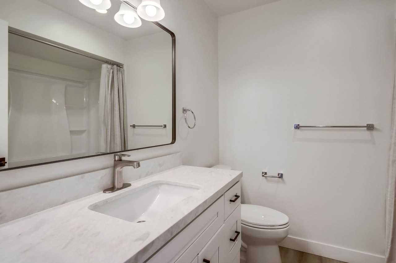 Two bedroom 1.5 bathroom beautifully upgraded with in unit laundry at the beach. Open House July 12 - Photo 6 of 10