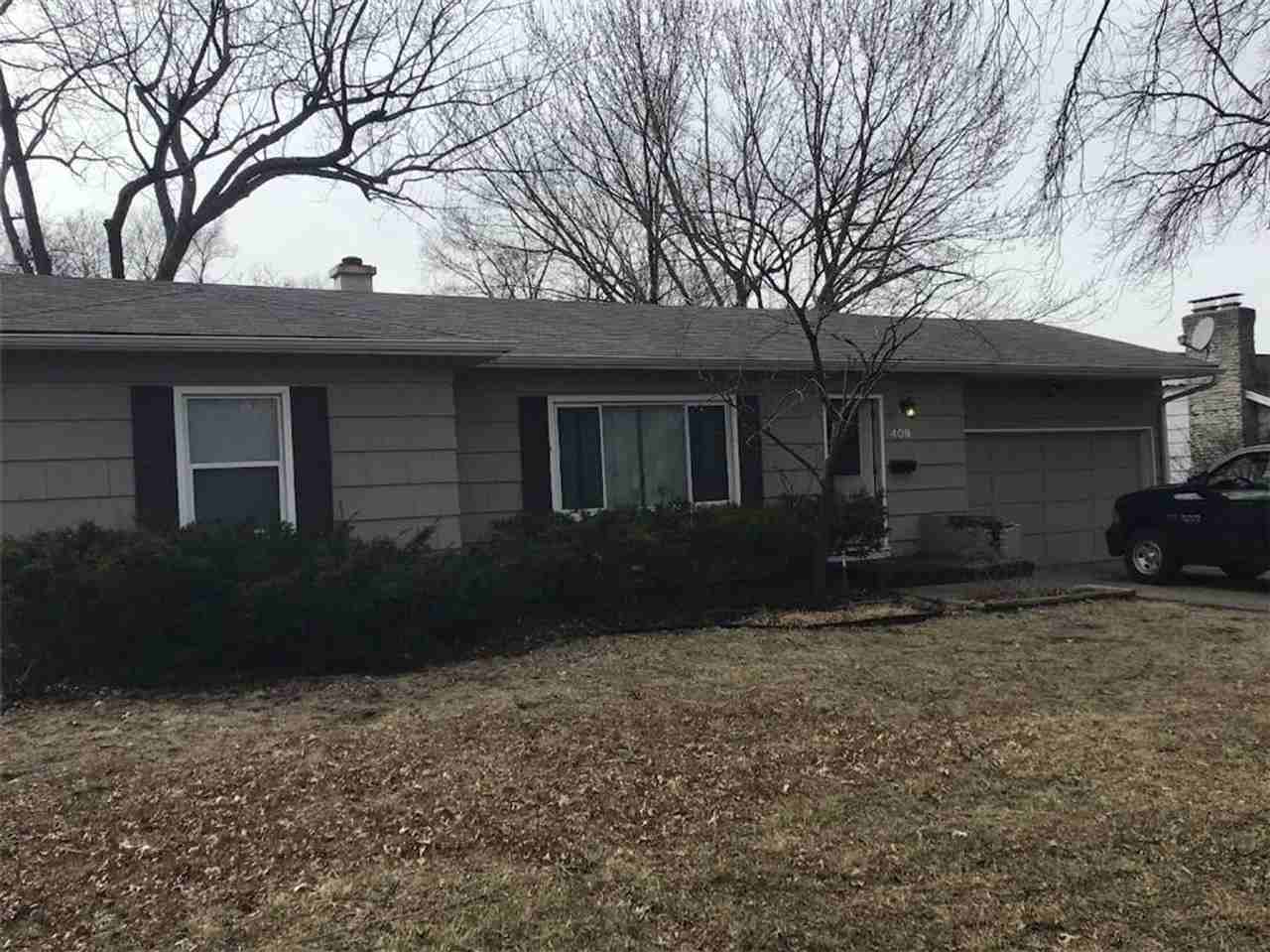 409 E 110th Ter - Photo 2 of 19