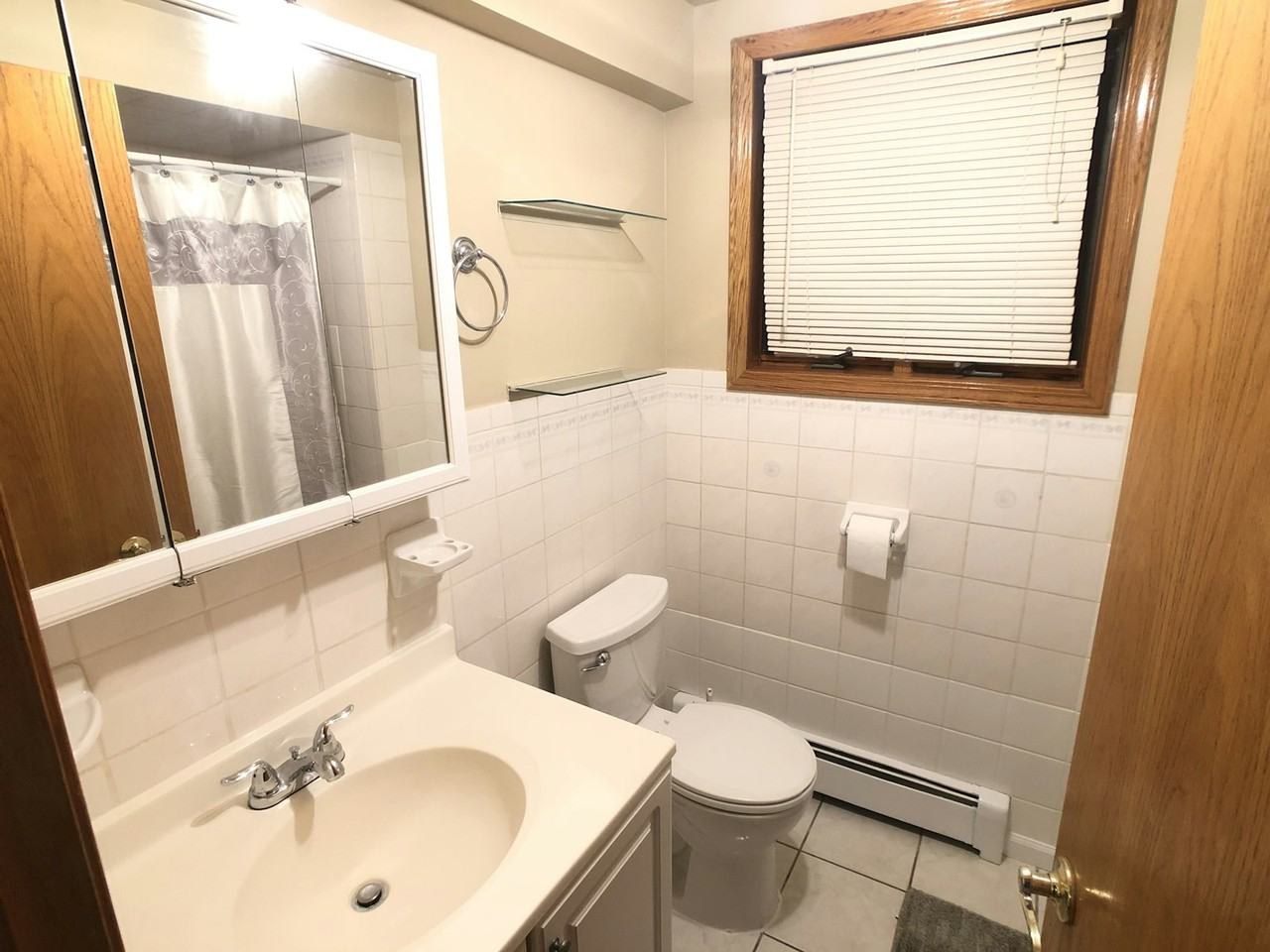 4521 South Saint Louis Avenue, Unit BSMT - Photo 5 of 8