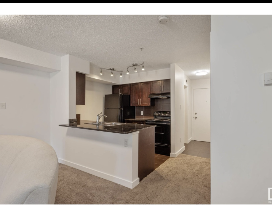 1080 McConachie Boulevard Northwest #107 - Photo 2 of 12