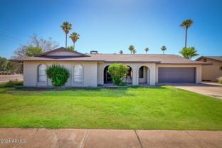 3305 S Holbrook Ln - Photo 1 of 1