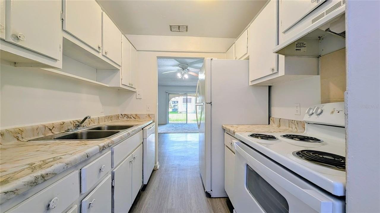 5957 Casa Del Rey Cir #A - Photo 3 of 6