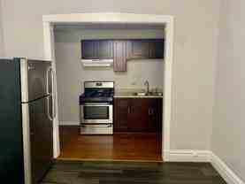 353-357 E 55th Place - Photo 1 of 1