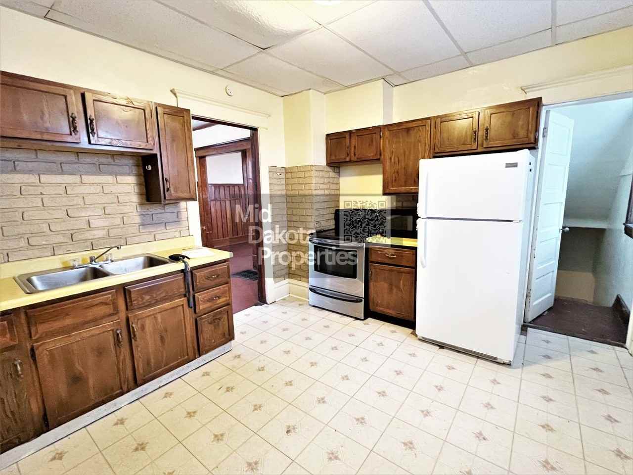 115 N Sanborn Blvd - Photo 5 of 16