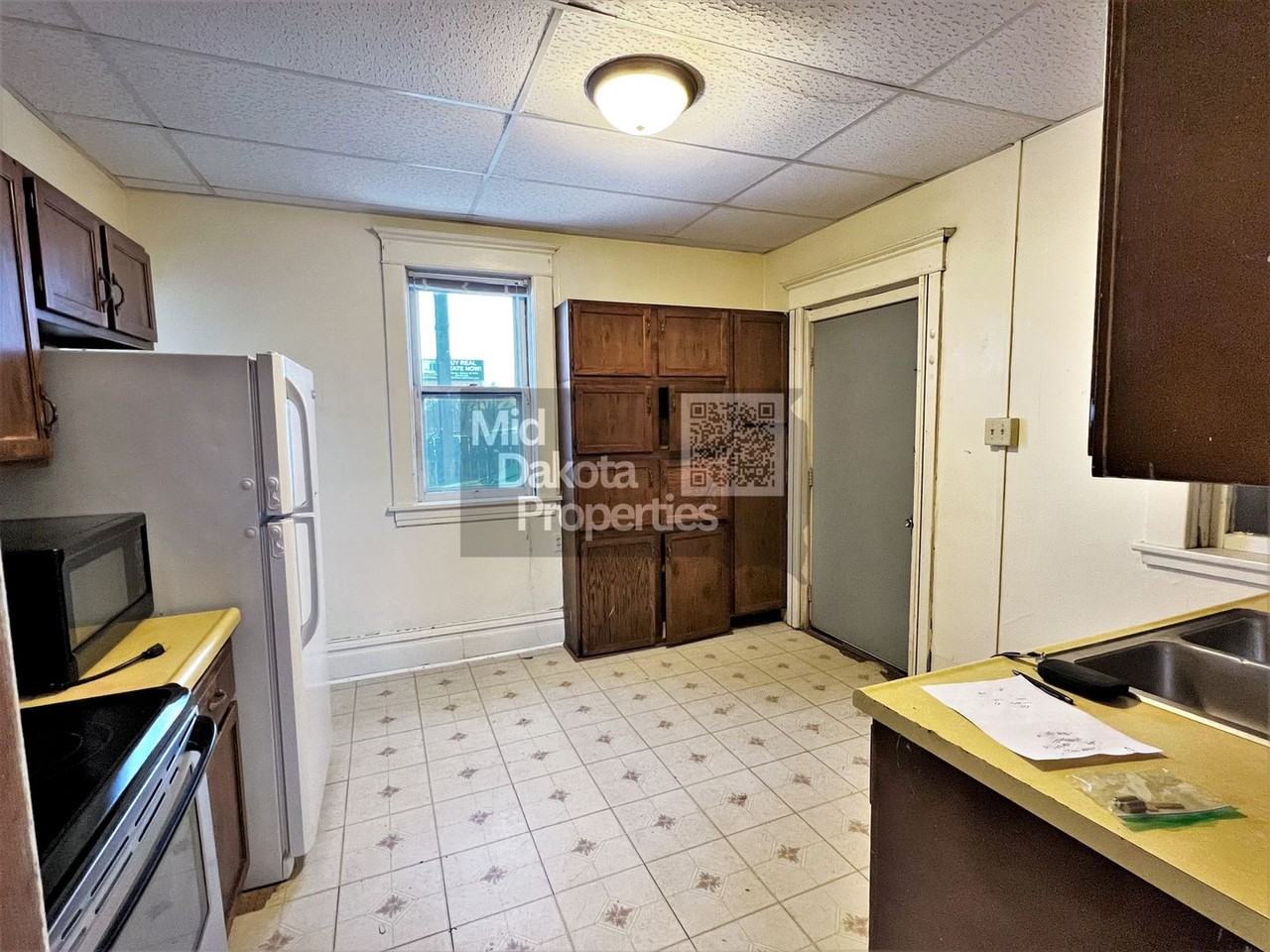 115 N Sanborn Blvd - Photo 6 of 16