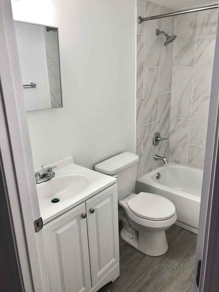 One Loop Apartments - Photo 4 of 12