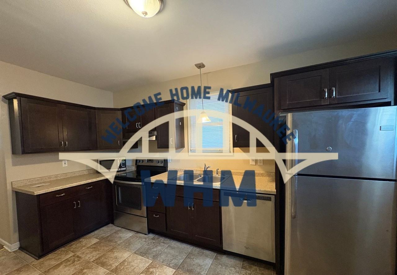 2417 S Howell Ave - Photo 2 of 6