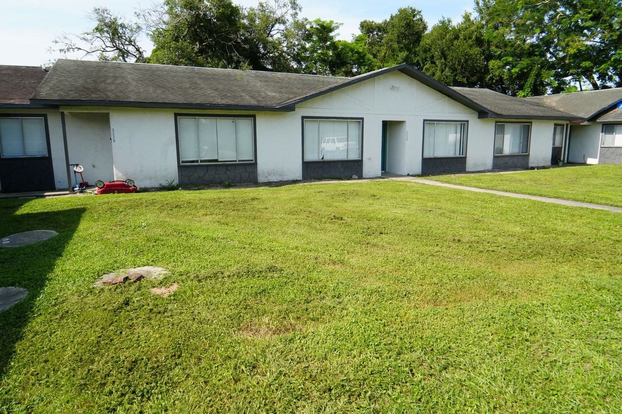 Magnolia Flats | 2 & 3 Bedroom Apartments in Orlando, FL - Photo 2 of 13