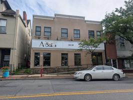 featured image of 128 W 4th St