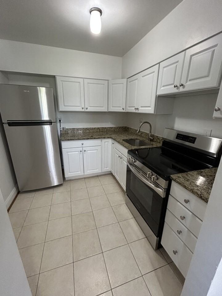 Walter Reed Apartments - Photo 2 of 4