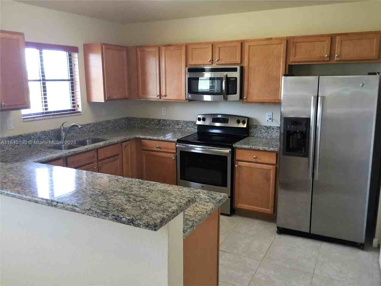 22301 Southwest 93rd Path #206 - Photo 2 of 10