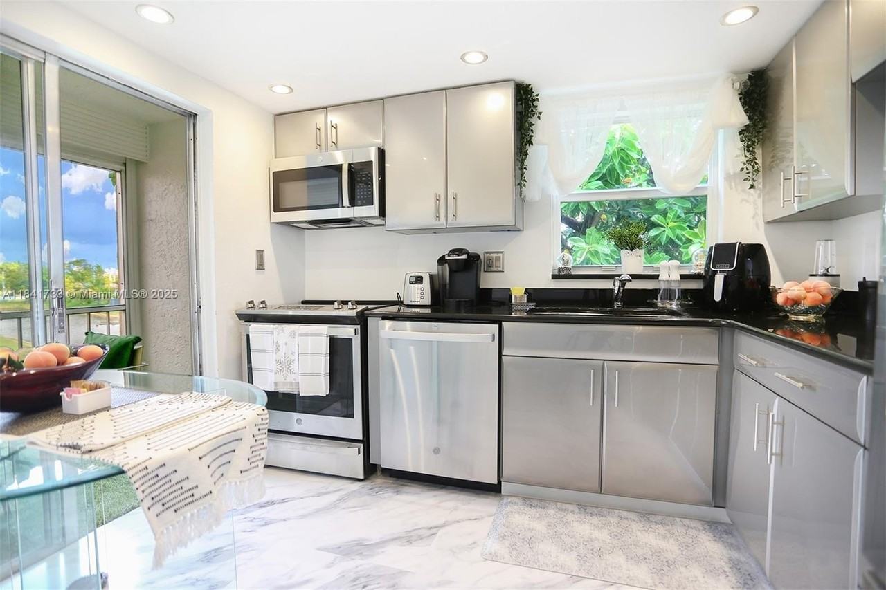 6570 Royal Palm Blvd #301J - Photo 2 of 25