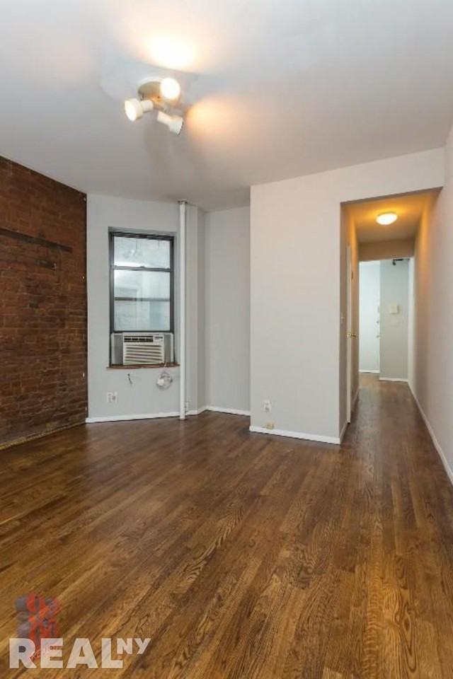 E 23rd St #11 - Photo 2 of 5