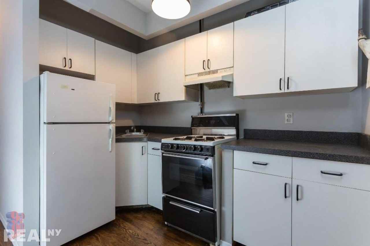 E 23rd St #11 - Photo 4 of 5