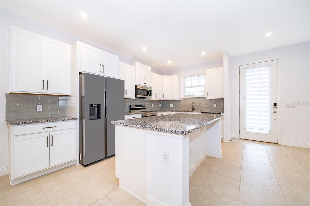 7039 Nemours Pkwy - Photo 7 of 26