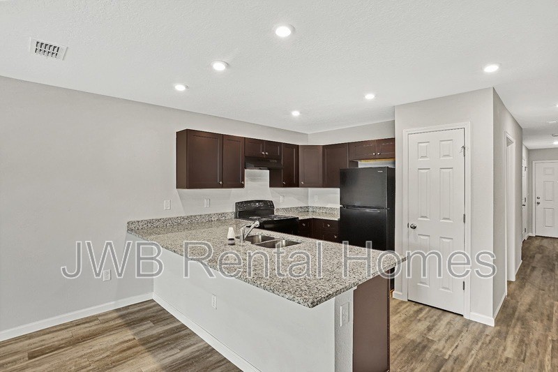 9810 Morgan Marsh Ct - Photo 2 of 13