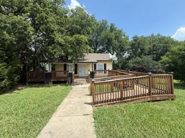 featured image of 103 W 3rd St