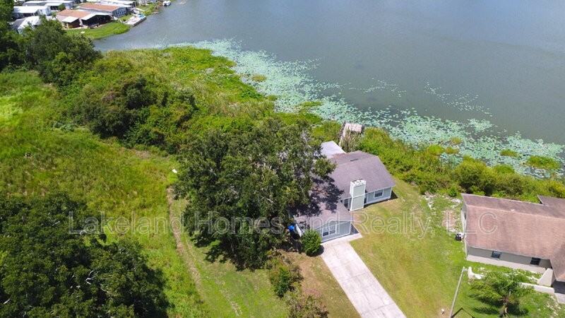 1204 Honeytree Ln W - Photo 2 of 50