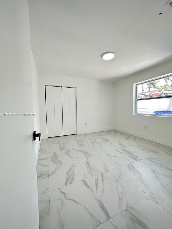 1445 Nw 34th St - Photo 3 of 9