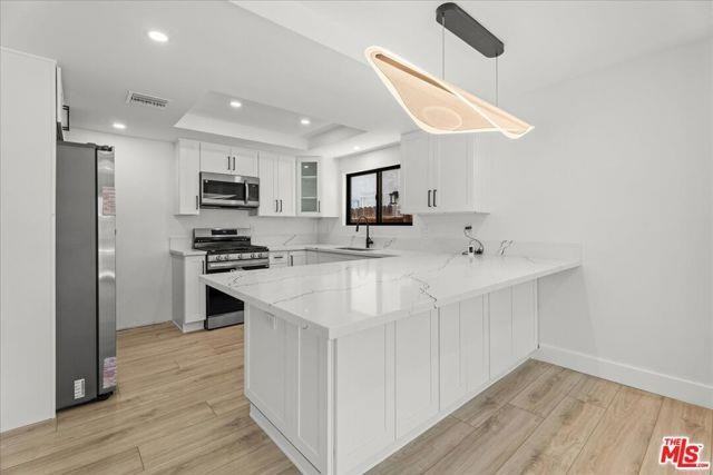 19701 Blythe St - Photo 2 of 8